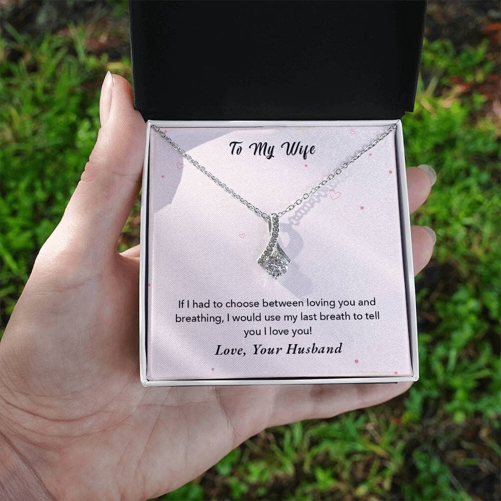 Enchanted Love Ribbon Necklace: A Timeless Token of Unending Affection Jewelry/AlluringBeauty ShineOn Fulfillment White Gold Finish Standard Box 