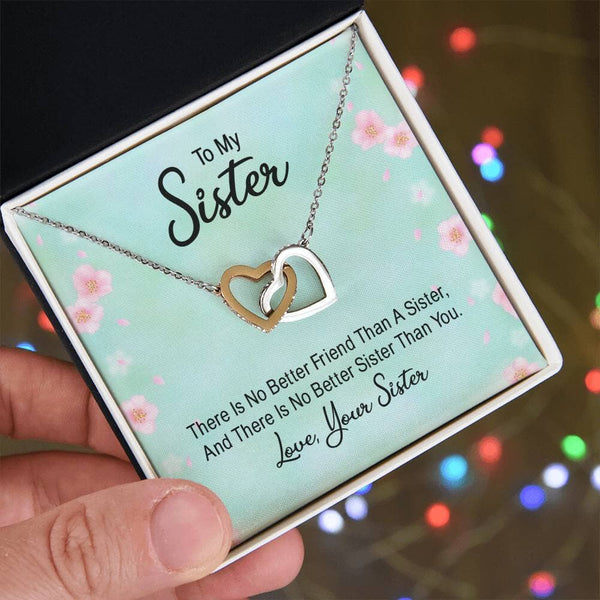 Sisters' Eternal Bond: Interlocking Hearts Necklace with Sentimental Message Jewelry/InterlockingHearts ShineOn Fulfillment Polished Stainless Steel & Rose Gold Finish Standard Box 