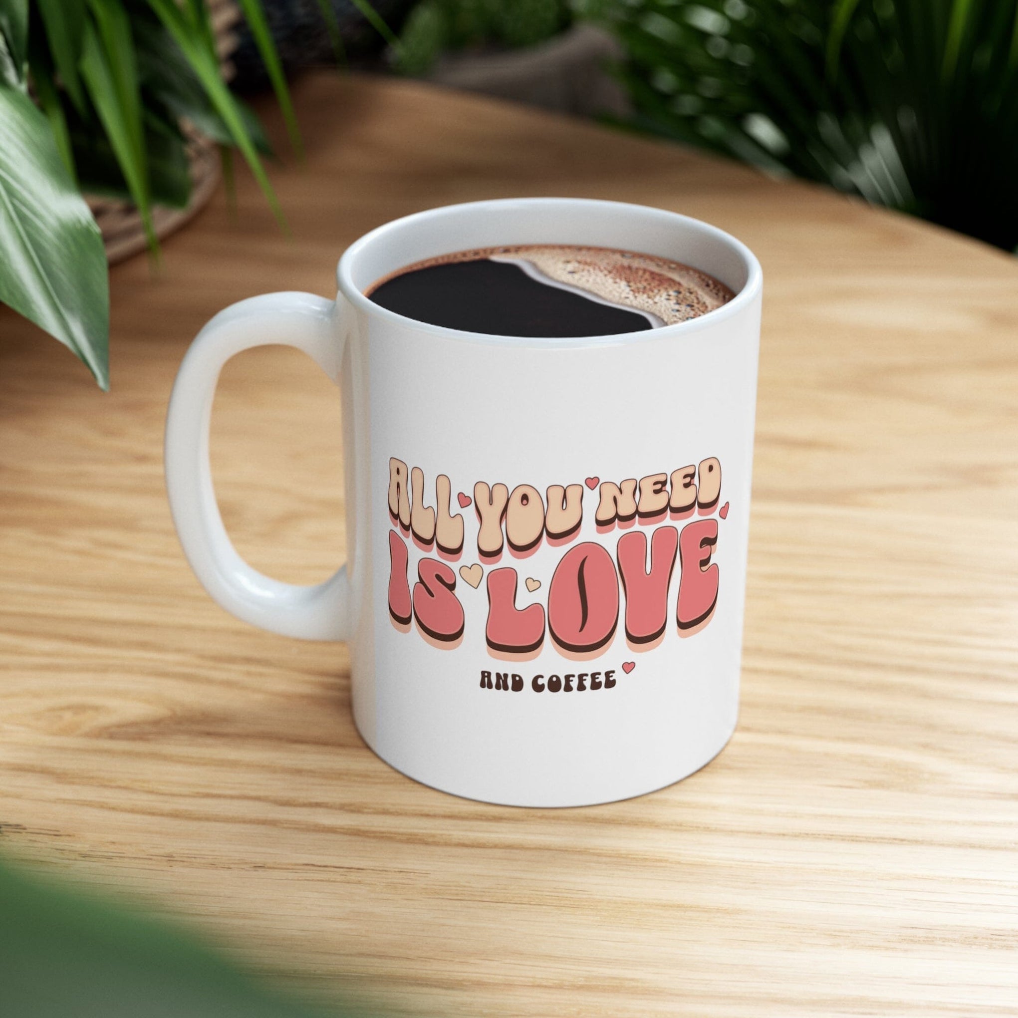 https://kendallscollection.com/cdn/shop/products/cup-of-affection-all-you-need-is-love-and-coffee-exclusive-web-edition-mug-printify-210580.jpg?v=1689066216&width=2040